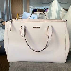 Light Pink Kate Spade handbag with shoulder strap